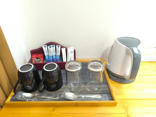 Παροχές για τσάι/καφέ στο Legacy Inn Ella