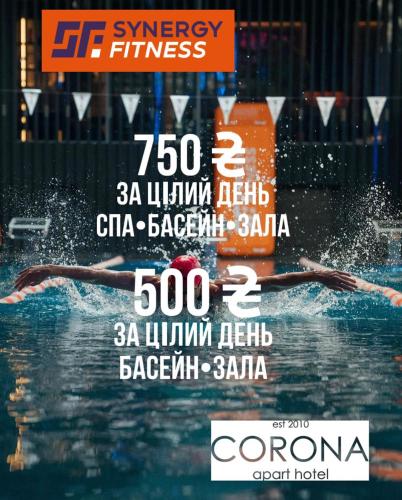 a poster of a swimmer in a swimming pool at Corona Hotel & Apartments in Odesa