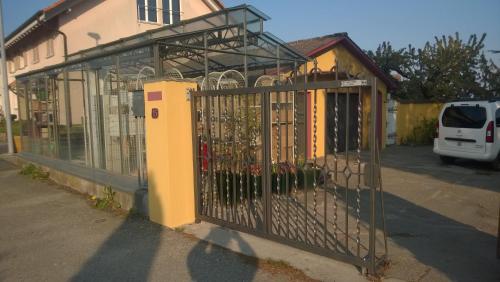 a gate in front of a building at Swiss Borzoi House in Bellerive