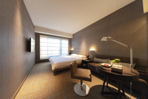 Katil atau katil-katil dalam bilik di Hotel Midtown Richardson