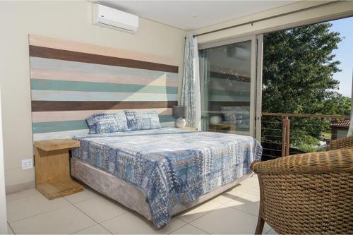 Ένα ή περισσότερα κρεβάτια σε δωμάτιο στο The Sapphire Guesthouse