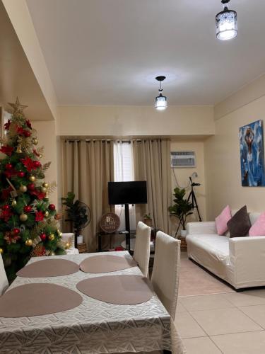 Гостиная зона в Elaris Suite Tagaytay 1Br WI-FI,PS4,Netflix&Kitchen