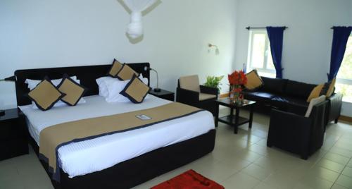 Postel nebo postele na pokoji v ubytování Mount Elgon Hotel & Spa