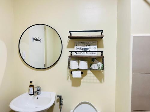 Ванная комната в Elaris Suite Tagaytay 1Br WI-FI,PS4,Netflix&Kitchen