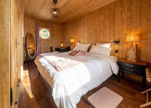 Postel nebo postele na pokoji v ubytování Chalet O'Bois-Centre Alsace