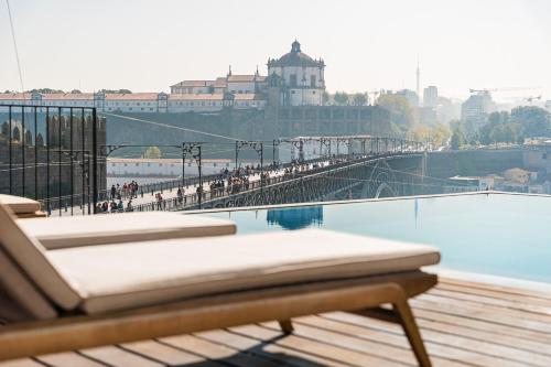 a view of a bridge over a body of water at GuestReady - D. Hugo Boutique Hotel B&B in Porto