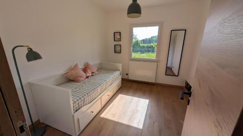 Postel nebo postele na pokoji v ubytování Belle Maison, calme avec parking