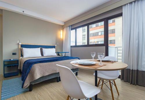 Postel nebo postele na pokoji v ubytování Flats Prime – Alpha Stay | Alphaville – Barueri – SP