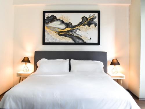 Ένα ή περισσότερα κρεβάτια σε δωμάτιο στο Reforma 284 King Size SUITE Swimming Pool, Parking & Kitchen