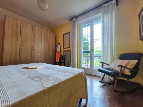 Ένα ή περισσότερα κρεβάτια σε δωμάτιο στο Casa di Amelie By Case al Lago