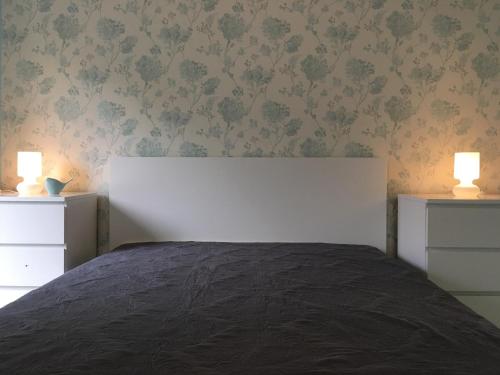 Posteľ alebo postele v izbe v ubytovaní Happy Mammy Bababarát Apartmanház 1 - Hűvös utca