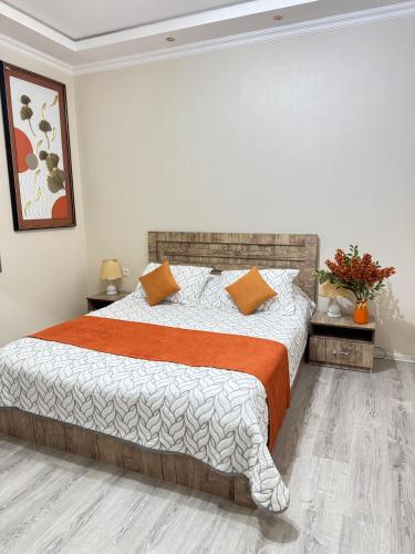 Llit o llits en una habitació de Happy House
