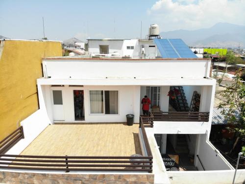 a view of the front of a house at Casa Ba-Al, Bonitos Departamentos para 2 a 8 personas a 5 min del centro de Oaxaca in Oaxaca City