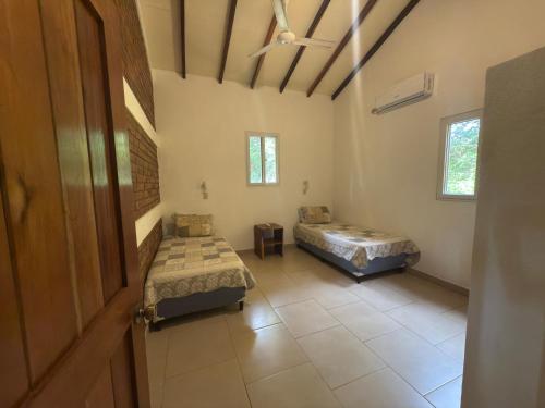 Postel nebo postele na pokoji v ubytování Casa Amarilla