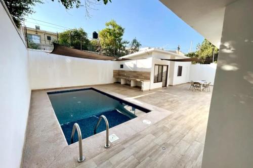 Bazén v ubytování Casa Céntrica con Alberca! nebo v jeho okolí