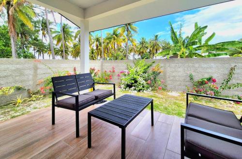 Fare Re'are'a - Charmant bungalow côté mer proche de la plage de Temae