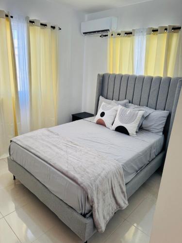 Ένα ή περισσότερα κρεβάτια σε δωμάτιο στο Welcome Home 2