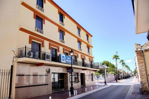 a building on the side of a street at Best Western Hotel Plaza Matamoros in Matamoros