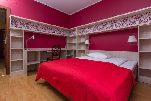 Ένα ή περισσότερα κρεβάτια σε δωμάτιο στο Apartament Stare Miasto 1