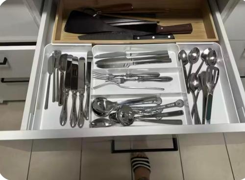 a drawer filled with utensils in a kitchen at Mains Rd 舒适双人间2张床2 in Brisbane