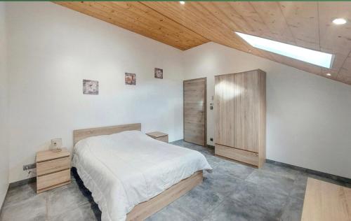 Postel nebo postele na pokoji v ubytování Gîtes des Charrières