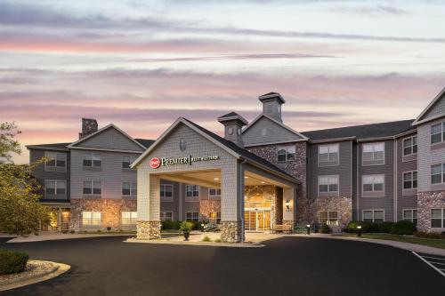 a rendering of the front of a hotel at Best Western Premier Bridgewood Hotel Resort in Neenah