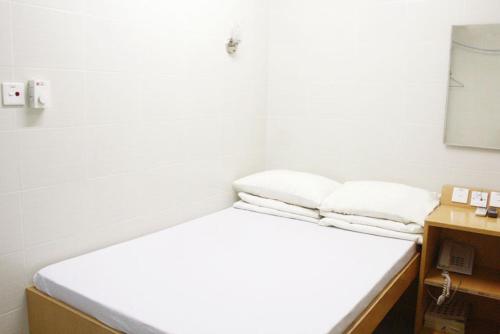 Krevet ili kreveti u jedinici u objektu Pearl Guesthouse - 6/F