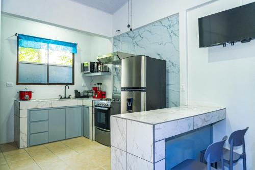 Η κουζίνα ή μικρή κουζίνα στο Deer Apartments Bahía Ballena