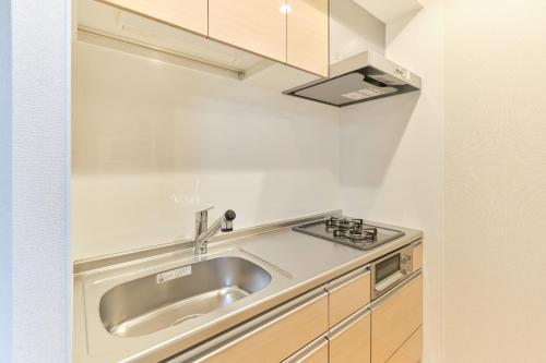 Kuchyň nebo kuchyňský kout v ubytování J-ARC Akebonobashi - Vacation STAY 17364