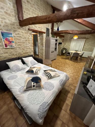 Postel nebo postele na pokoji v ubytování Le Longbeach 2