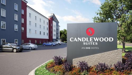 a sign in front of a building at Candlewood Suites Annapolis by IHG in Annapolis
