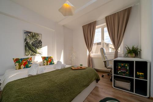 Una cama o camas en una habitación de Piatra Craiului Cozy Flat