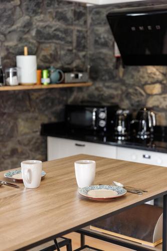 Kuchyň nebo kuchyňský kout v ubytování BIOMA Adega - Escala Gourmet