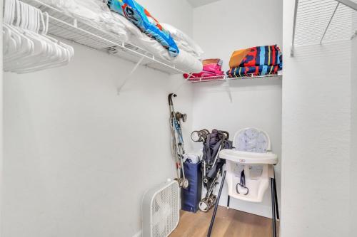 a room with skis and ski equipment on a wall at Disney Bunk Room--Windsor Hills in Orlando