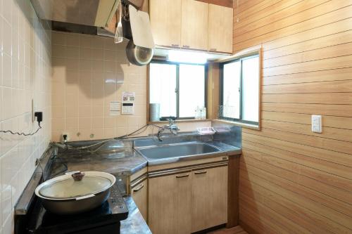 Kuchyň nebo kuchyňský kout v ubytování Sunland S152 - Vacation STAY 54960v