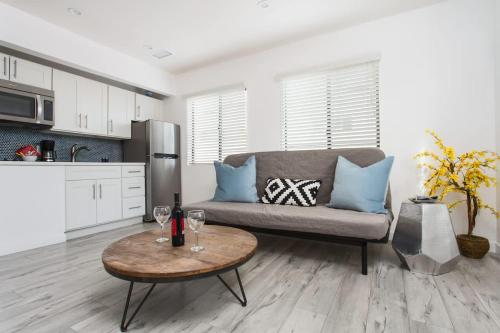 a living room with a couch and a table at Sunny 1 Bedroom in the Heart of Venice Beach - #3 in Los Angeles