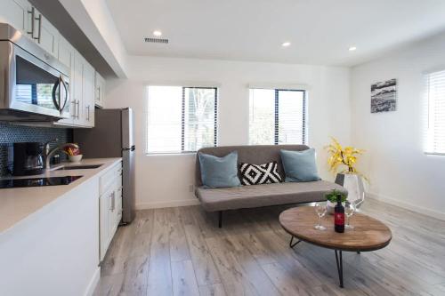 a living room with a couch and a table at Sunny 1 Bedroom in the Heart of Venice Beach - #3 in Los Angeles