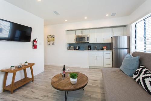 a living room with a couch and a table at Sunny 1 Bedroom in the Heart of Venice Beach - #3 in Los Angeles