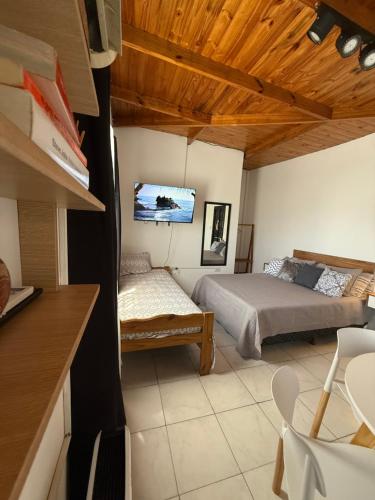 Postel nebo postele na pokoji v ubytování Merlo INK3