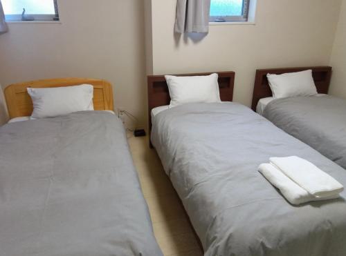 Ένα ή περισσότερα κρεβάτια σε δωμάτιο στο K,AND,M,OOIMACHI - Vacation STAY 60966v