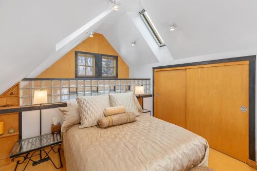 a bedroom with a large bed in a attic at Galena Chalet - Valley View 1 Br 1 Ba 2 Half Ba Sleeps 6 in Telluride