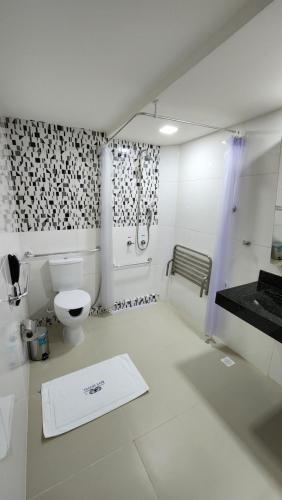 Koupelna v ubytování Max Hotel