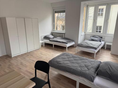 Giường trong phòng chung tại Wohnquartier GbR
