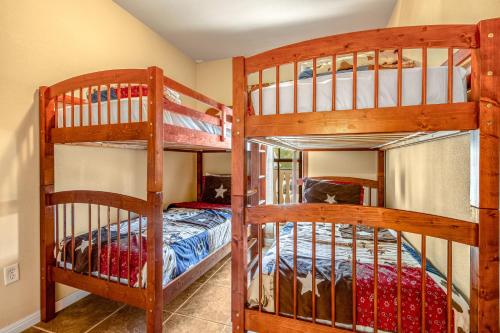 a bedroom with two bunk beds in a room at The Village at Gruene - Unit 203 in Gruene