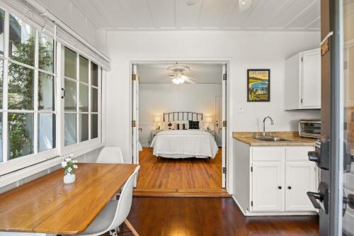 En eller flere senge i et værelse på Belle Caruso