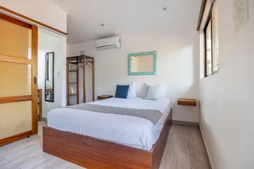 En eller flere senge i et værelse på La Buena vida Cabina 2