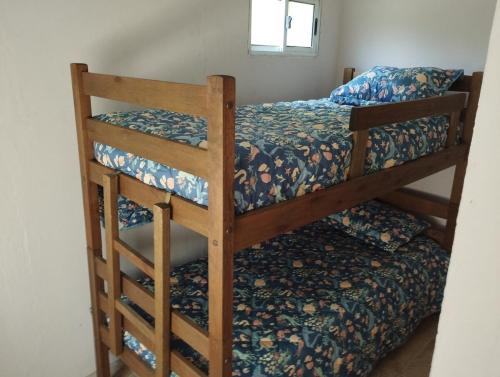 Ein Bett oder Betten in einem Zimmer der Unterkunft Casa para 4 personas en Playa Hermosa