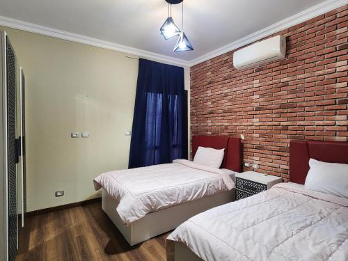 Ένα ή περισσότερα κρεβάτια σε δωμάτιο στο Cozy green stay