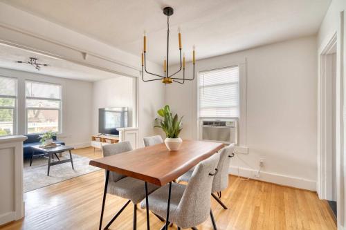 a dining room with a wooden table and chairs at Stay Portland - La Casa Burnside -Local Eateries -Shops - Bars in Portland