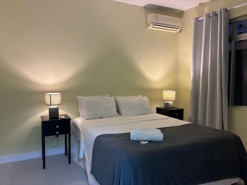 Postel nebo postele na pokoji v ubytování Aptos completos com localização privilegiada no coração de Floripa – CSNs